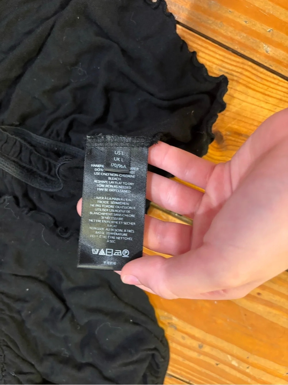 (439) BLACK RUFFLE TOP - Picture 7 of 7